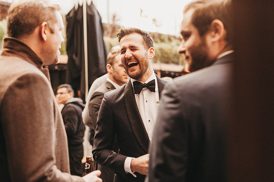 Groom laughing